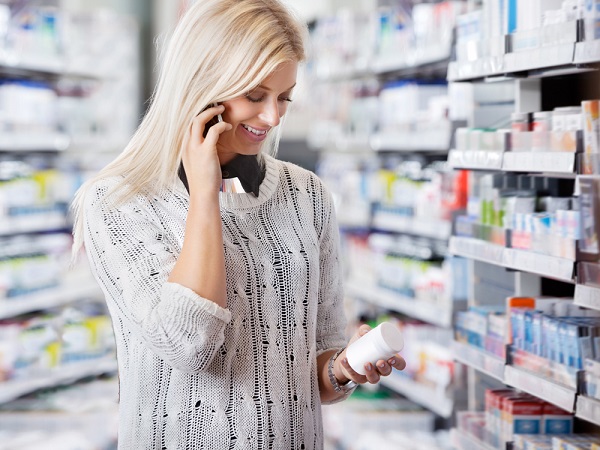 Woman in Pharmacy Talking on Phone
